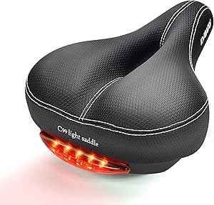 Daway C99 – Sillín de bicicleta, unisex, cómodo con asiento ancho de piel, para bicicleta de montaña con luz trasera, suspensión, suave, espuma acolchada, resistente al agua, compatible con la mayoría de bicicletas