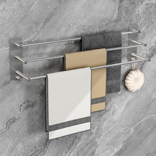 Soporte para toallas autoadhesivo de 75cm con 3 barras. Fabricado en acero inoxidable SUS304, asegura resistencia a la humedad y rayones. Se adhiere sin perforaciones, ideal para superficies lisas como azulejos, mármol y vidrio. No apto para superficies pintadas o de yeso.